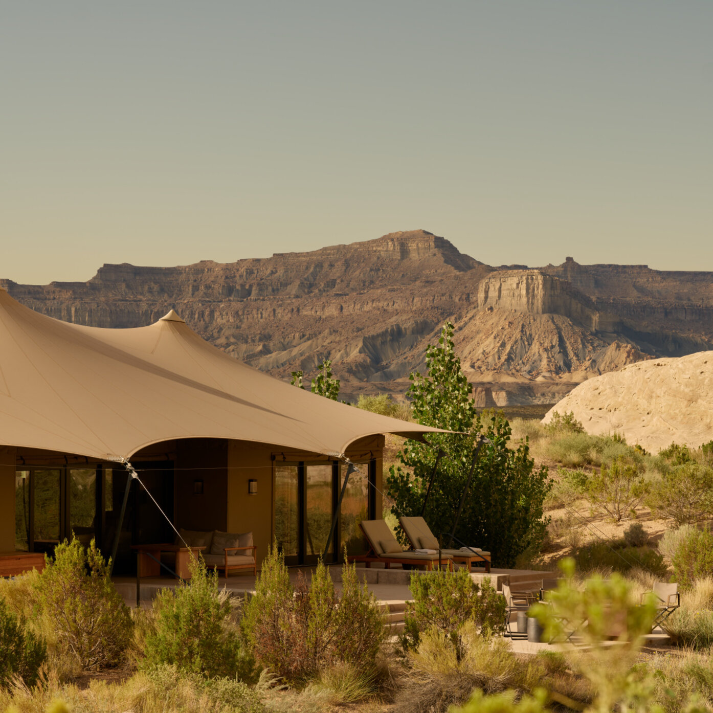 Camp Sarika at Amangiri Canyon Point Utah — tented pavilions amid dramatic desert mesa landscape