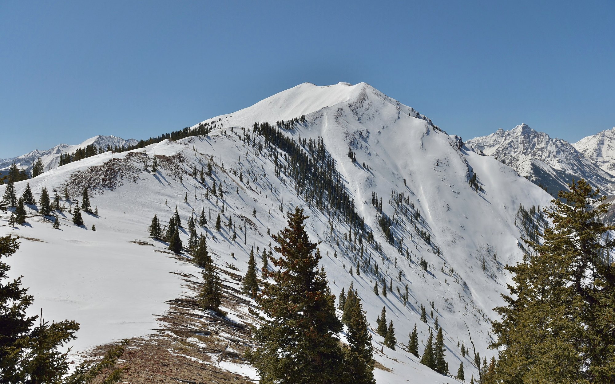 High Colorado ski peak under winter light — HauteBlack Vail Winter Week