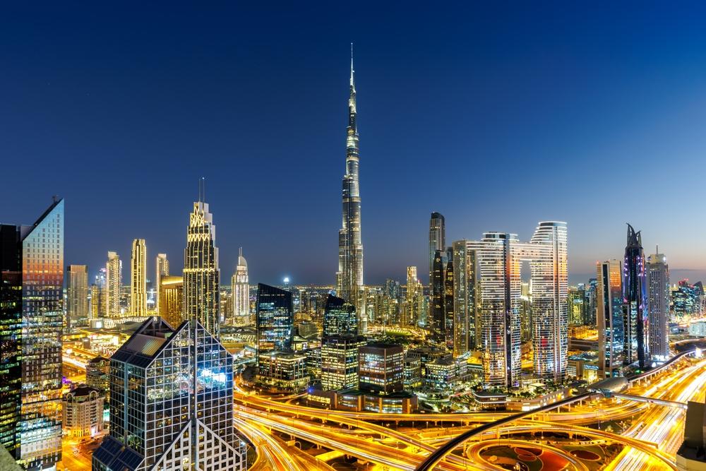 Dubai skyline at twilight with the Burj Khalifa illuminated — HauteBlack Dubai & Abu Dhabi Access journey