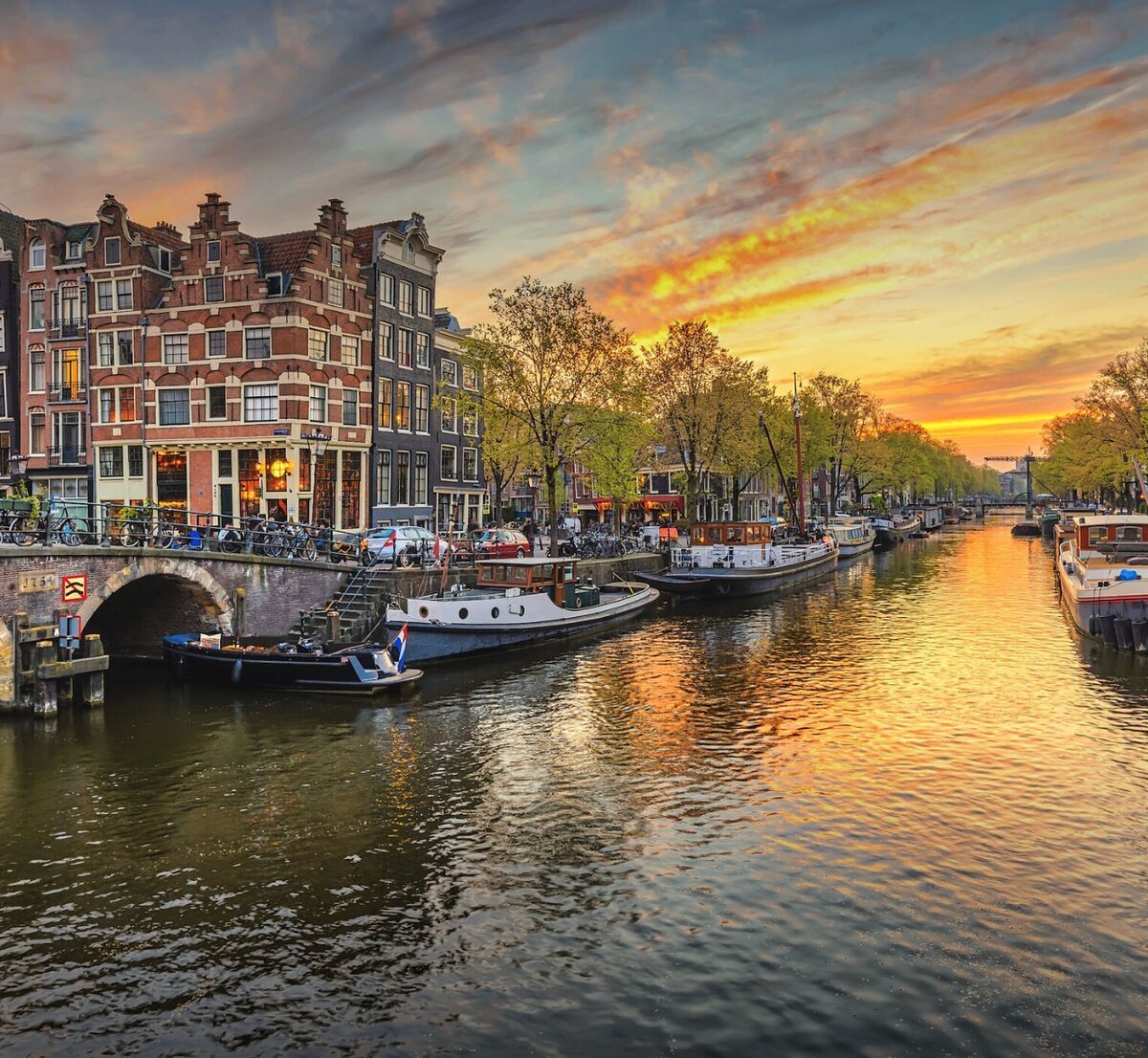 The Grand Tour of Europe — Amsterdam luxury travel, golden hour canal cruise — HauteBlack