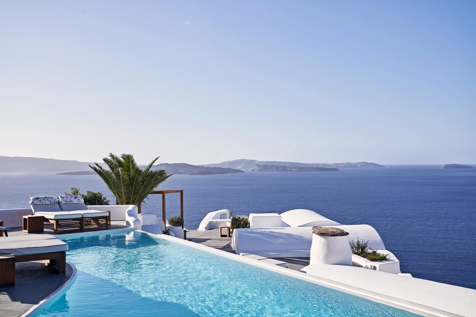 Athens & the Cyclades — Greece bespoke itinerary, Santorini caldera infinity pool — HauteBlack